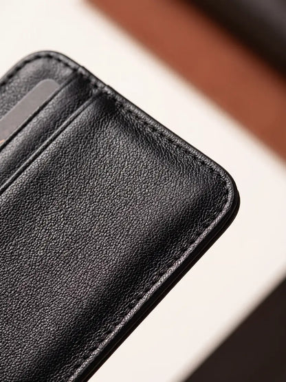 Close-up of the black leather grain and rounded corner